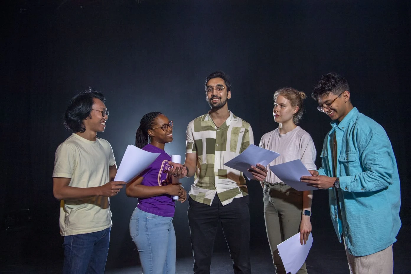 Keshav discussing ideas with a group of fellow students