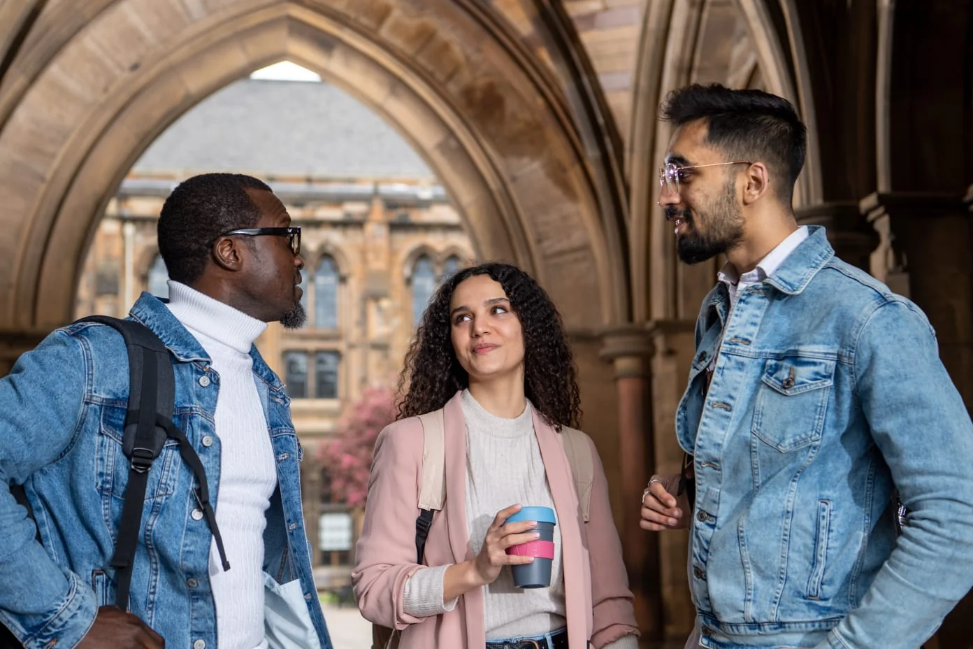 Keshav in conversation in the University of Glasgow cloisters